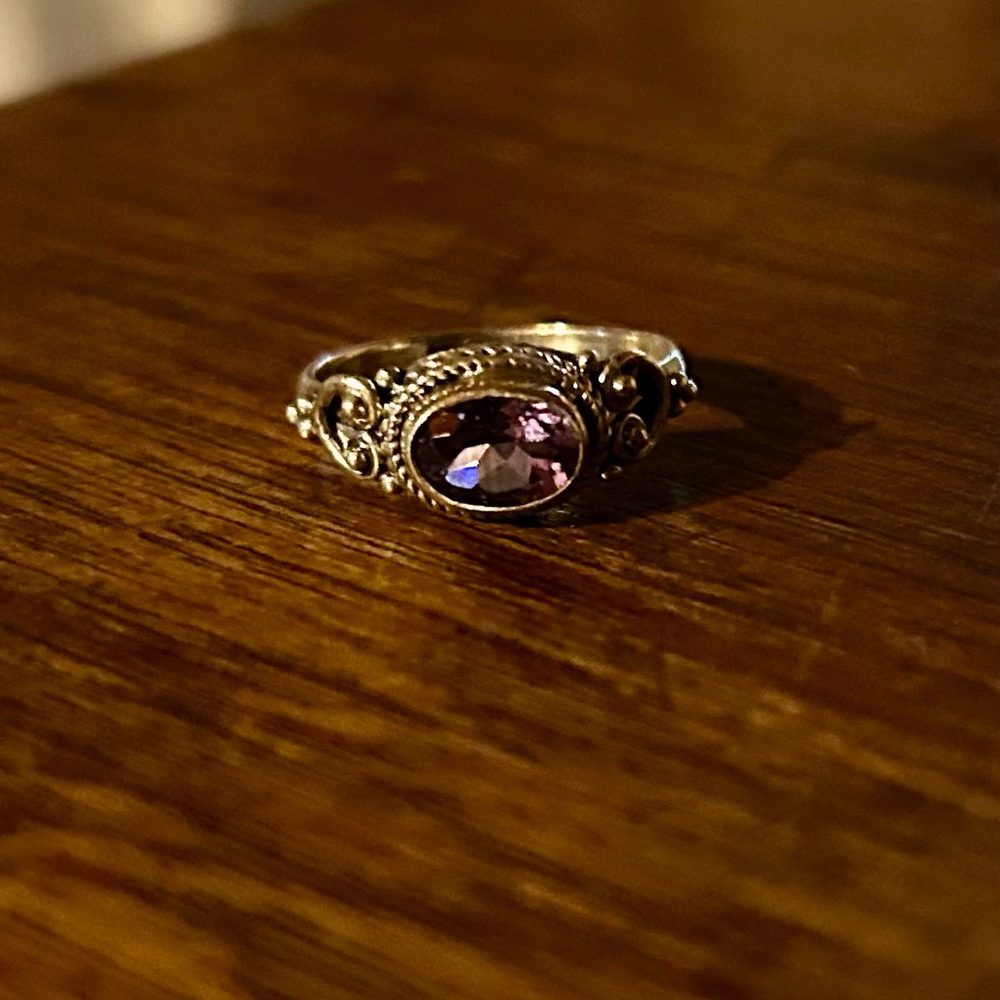 Intricate Silver and Purple Gemstone Ring
